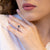 Anello In Oro Bianco 18 KT Con Zaffiro Ovale E Giro Di Diamanti