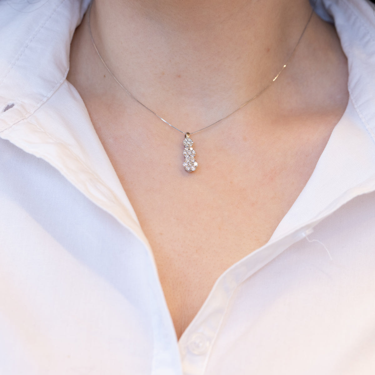 18kt white gold necklace with tris of diamond flower pavé