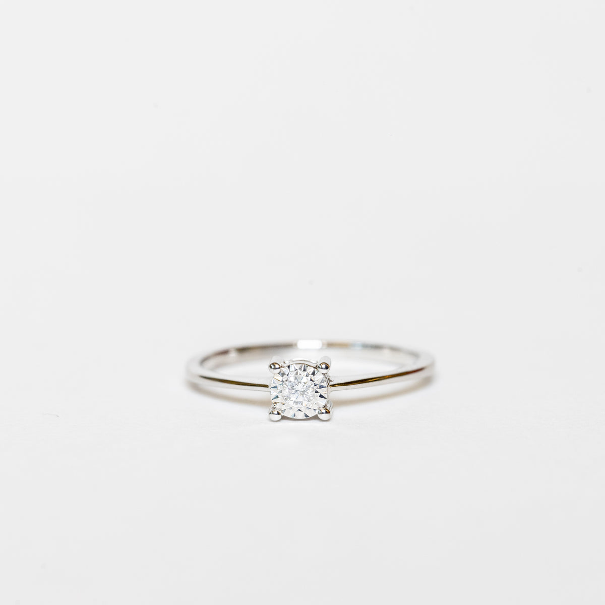 Anello Solitario In Oro Bianco 18 kt E Diamante da 0.12kt