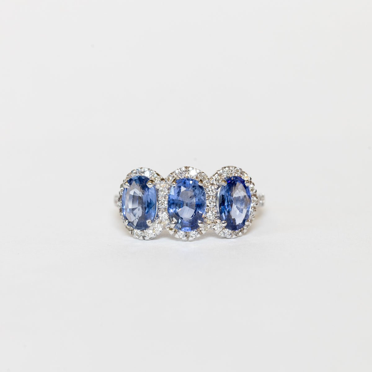 18KT White Gold Trilogy Ring with Oval-Shaped Sapphires and Diamonds