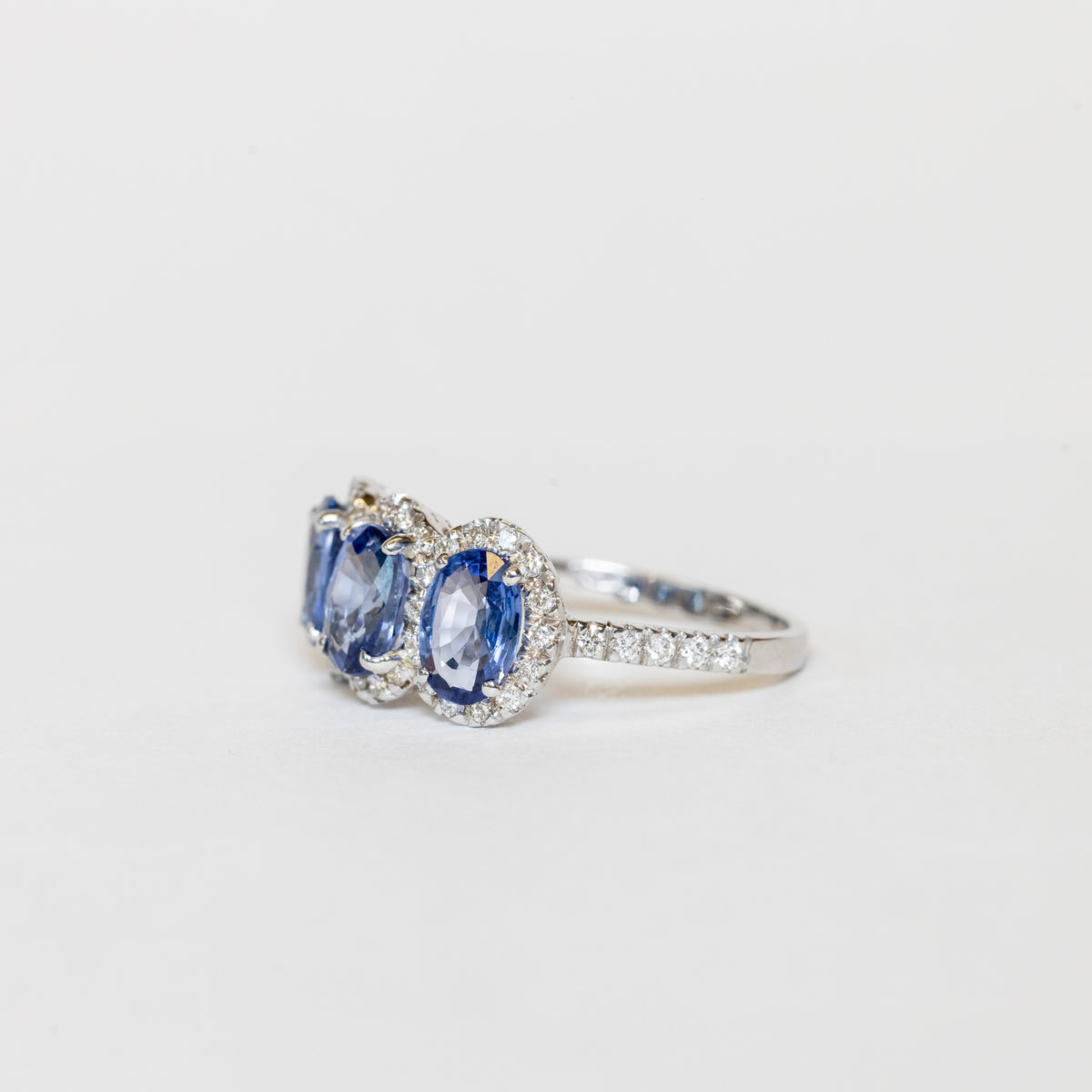 18KT White Gold Trilogy Ring with Oval-Shaped Sapphires and Diamonds