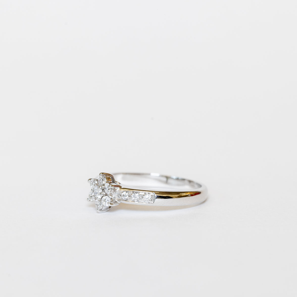 Solitaire Ring With Central Flower In Diamond Pavè