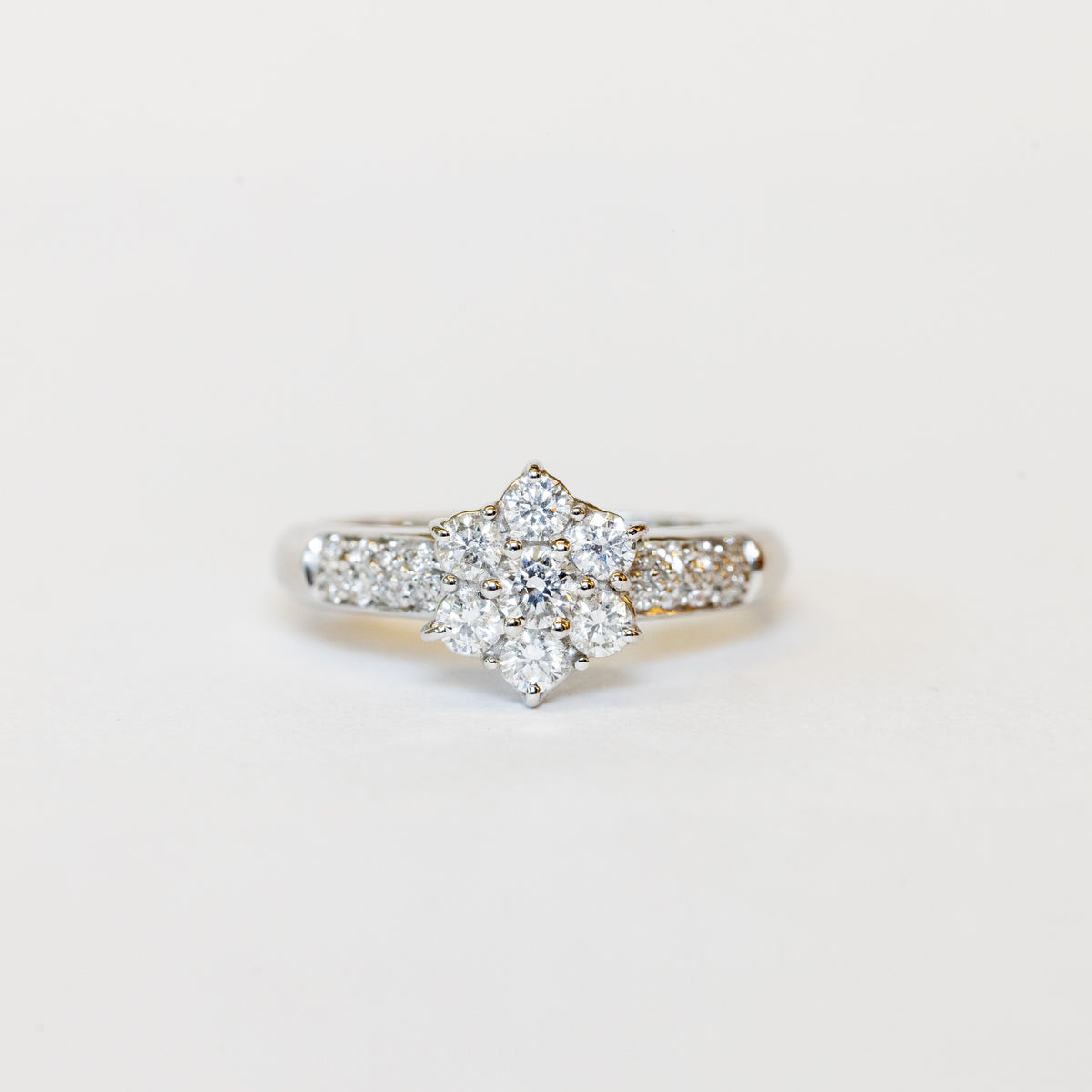 18K White Gold Solitaire Ring With Pavé Diamond Flower