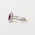 Anello In Oro Bianco 18 Kt Con Rubino Ovale E Giro Di Diamanti