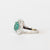 Anello In Oro Bianco 18 Kt Con Smeraldo Centrale E Doppio Giro Di Diamanti Illussion