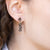 Orecchini mille cuori in oro giallo 18 kt con diamanti bianchi e neri