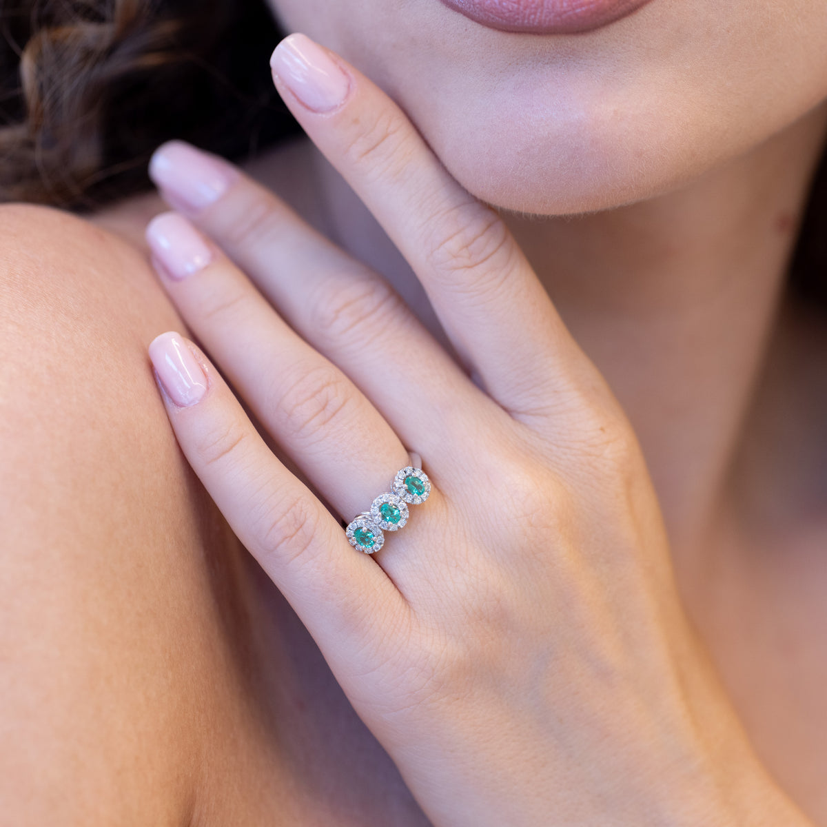 18K White Gold Trilogy Ring With Emeralds Surrounded by Diamonds