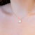 18kt White Gold and Pearl Necklace with Light Point