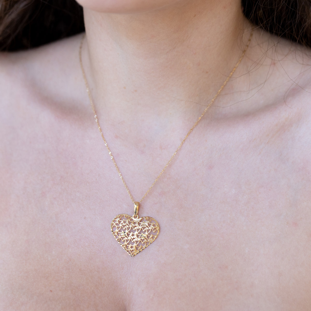 Collana in Oro Giallo 18 kt  con fantasia "Cuore di Stelle"