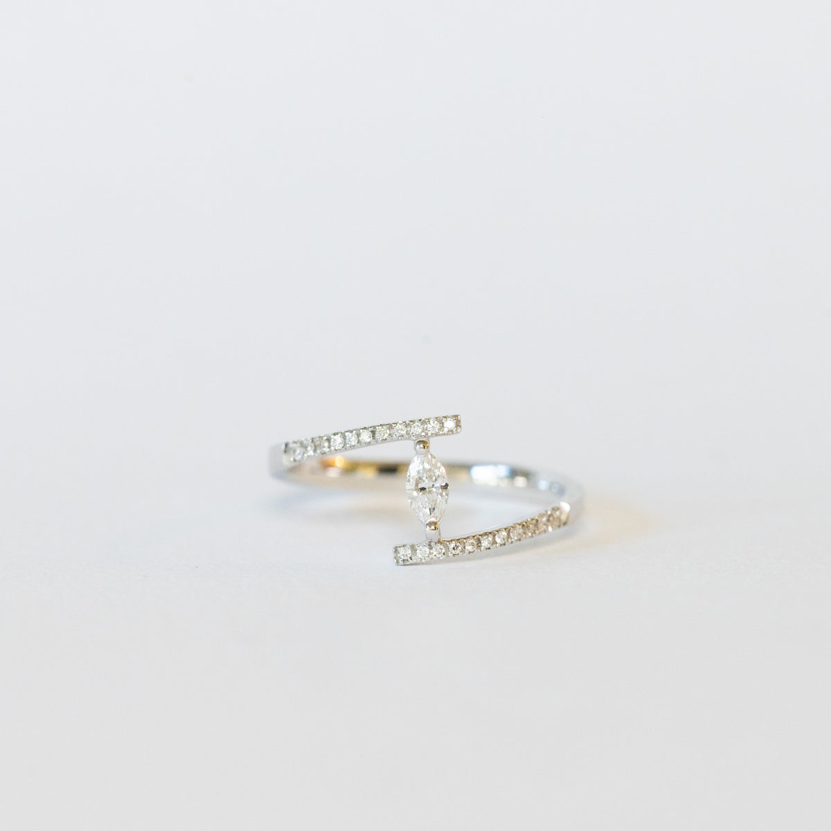 18kt white gold solitaire ring with marquise cut diamond