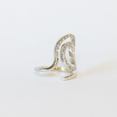 Anello fantasia a spirale in oro bianco 18 kt e diamanti