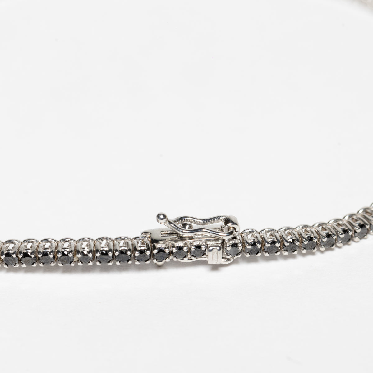 Bracciale Tennis in oro Bianco 18 kt con diamanti Neri e Diamanti