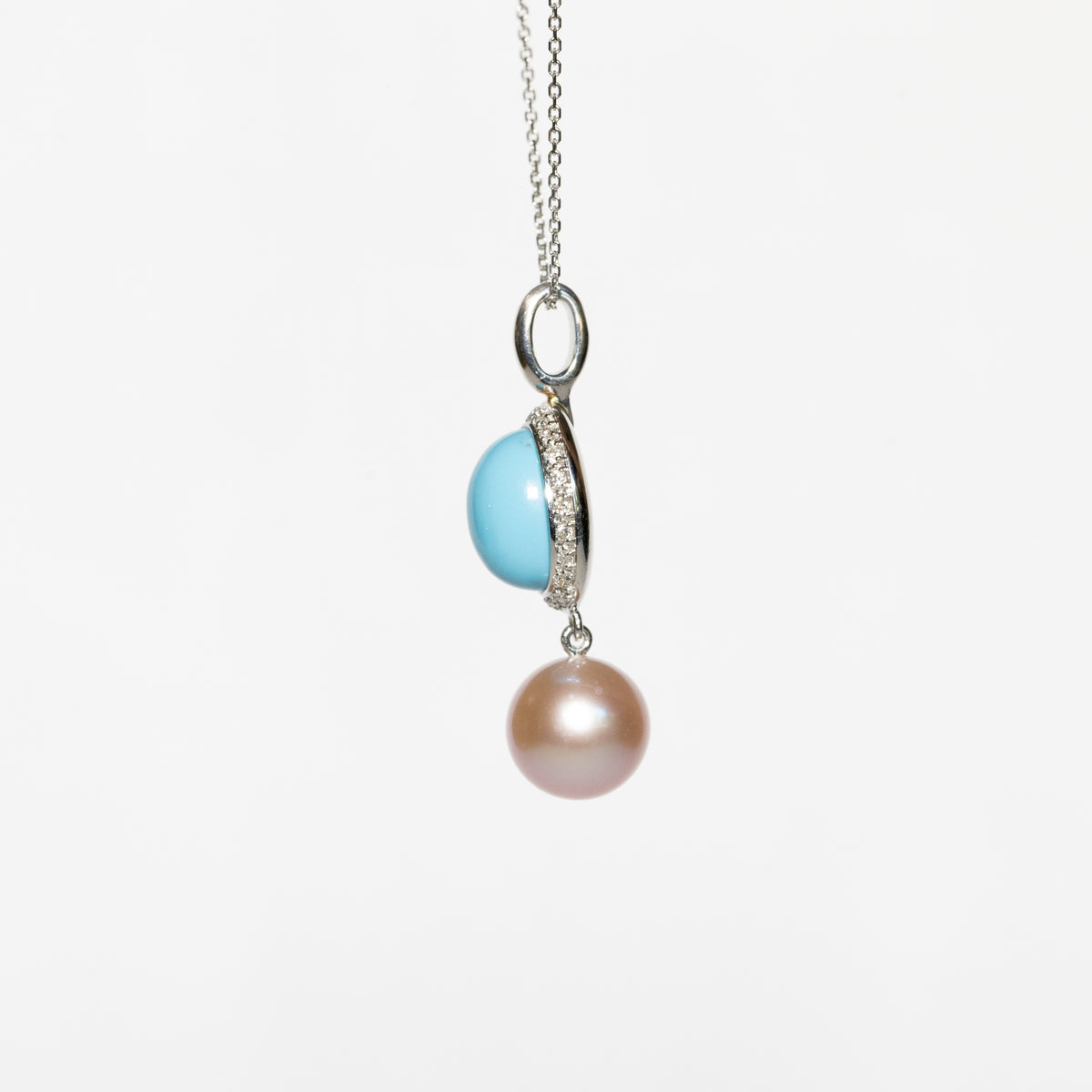 18kt white gold necklace with turquoise and pearl pendant