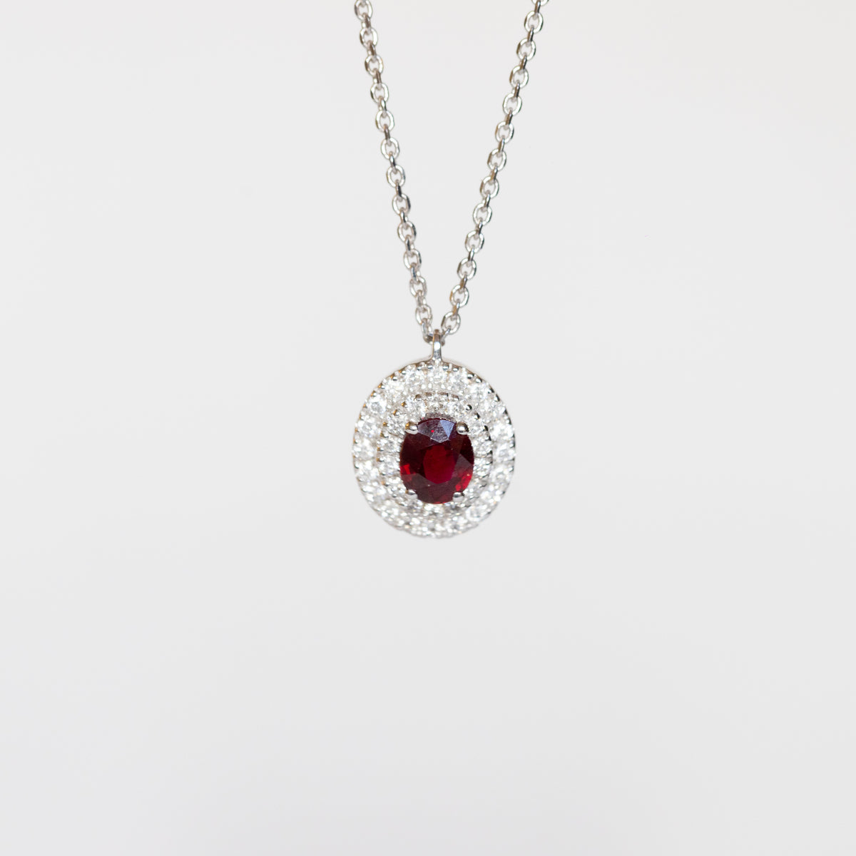 18kt white gold necklace with ruby ​​and double row of diamonds