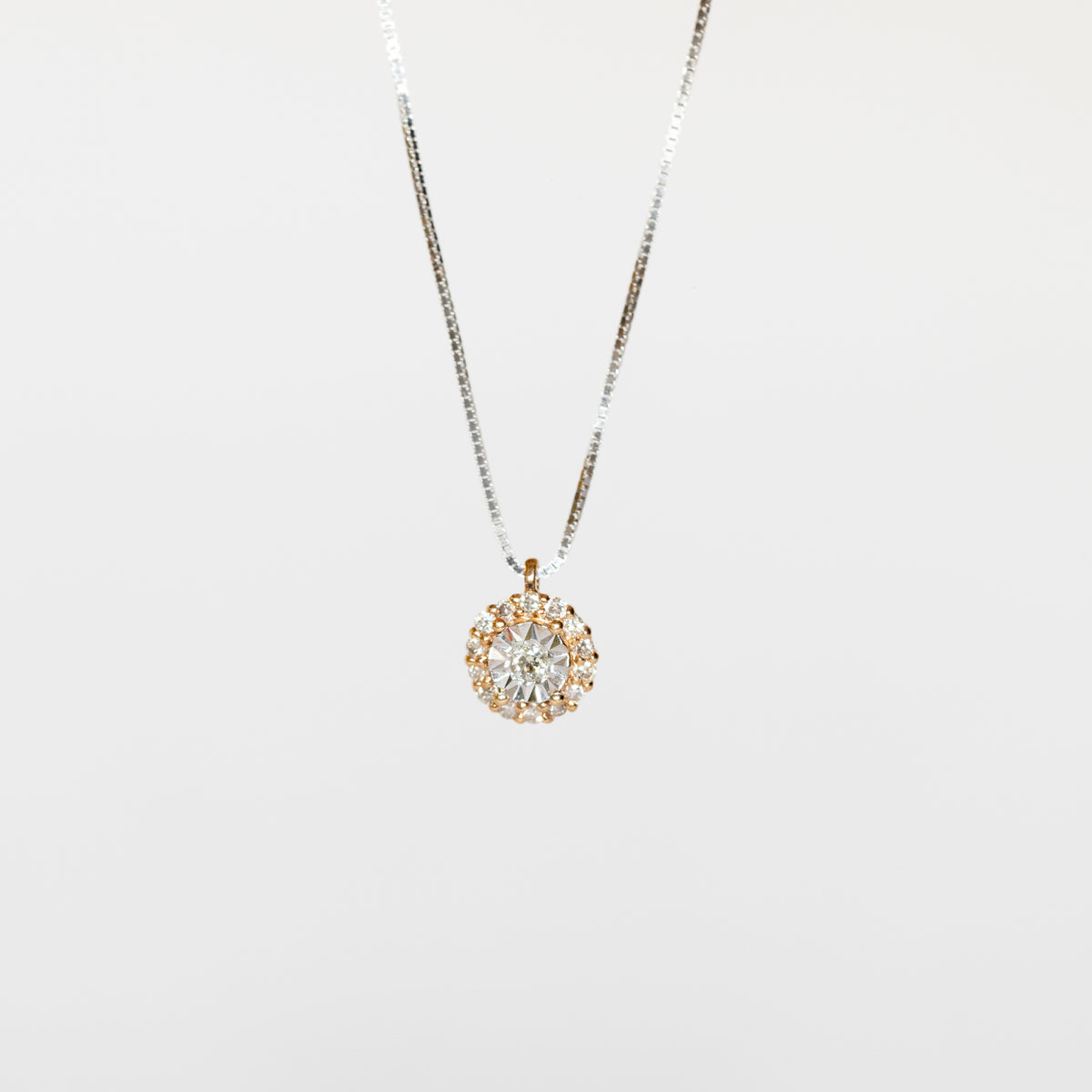 Collana punto luce pavé in oro bianco e rosa 18 kt e diamanti