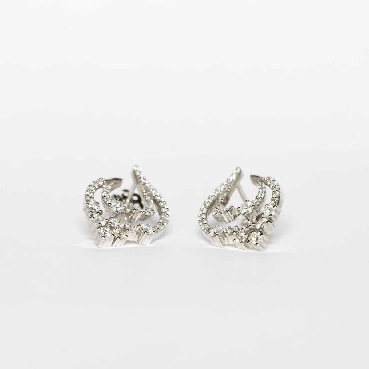 Luxury Fantasy Shape Earrings in 18kt White Gold and Surround in Rotating Diamonds