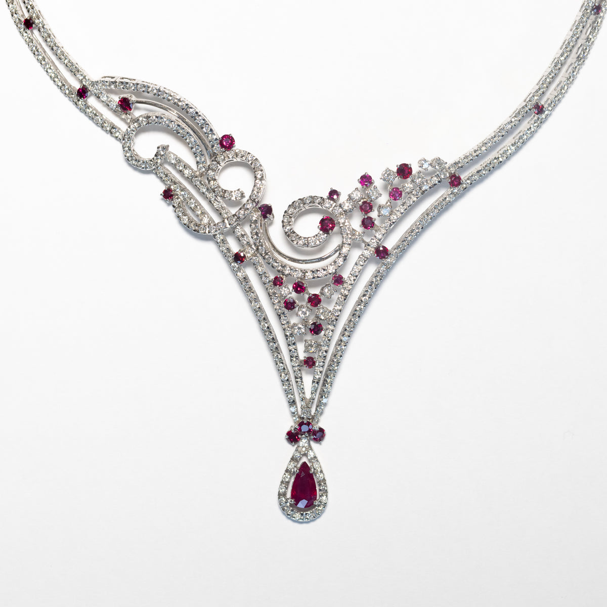 Collier Luminarie Necklace in 18KT White Gold with Drop Cut Ruby Pendant, Scattered Round Brilliant Rubies and Diamonds