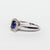 Anello in oro bianco 18 kt con Zaffiro contornato di diamanti