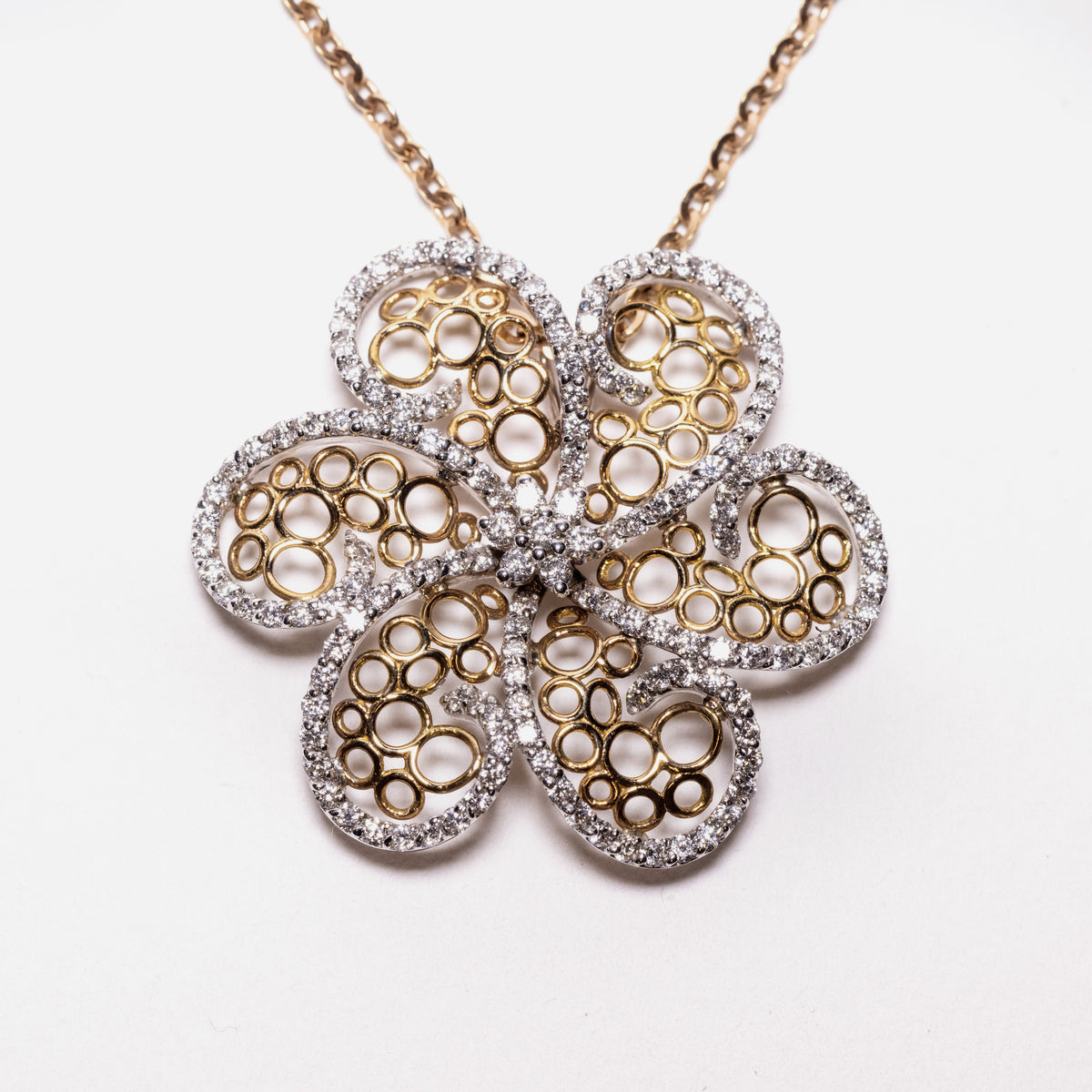 Essence necklace in 18 kt white and yellow gold with diamond and gold petals in a circle shape (unique creation)