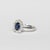 Anello in oro bianco 18 kt con zaffiro e contorno di diamanti