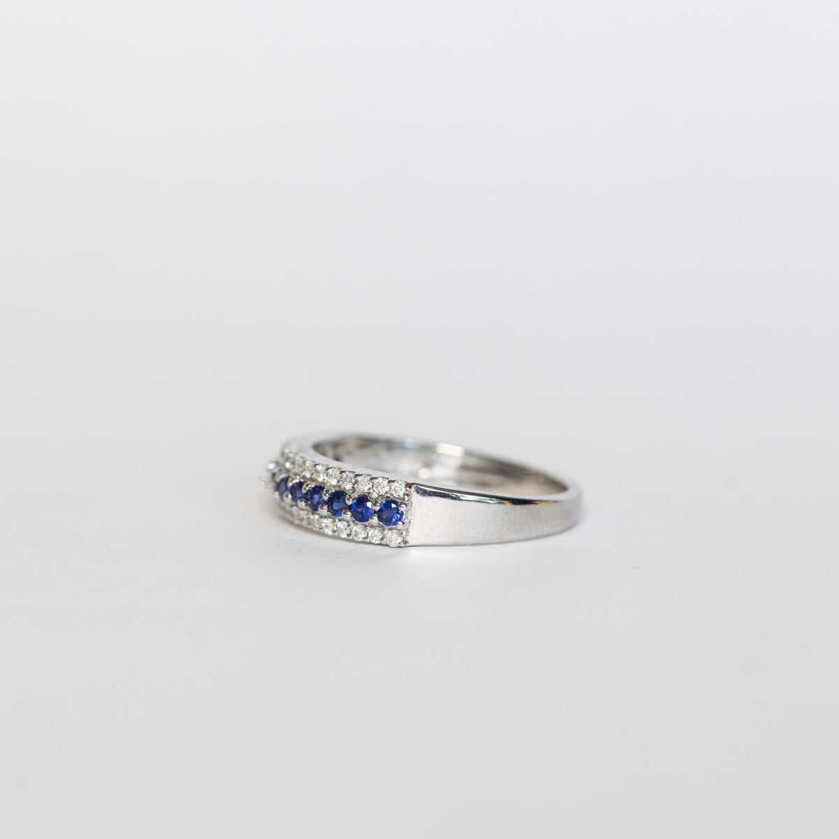 18kt white gold eternity ring with sapphires and diamonds