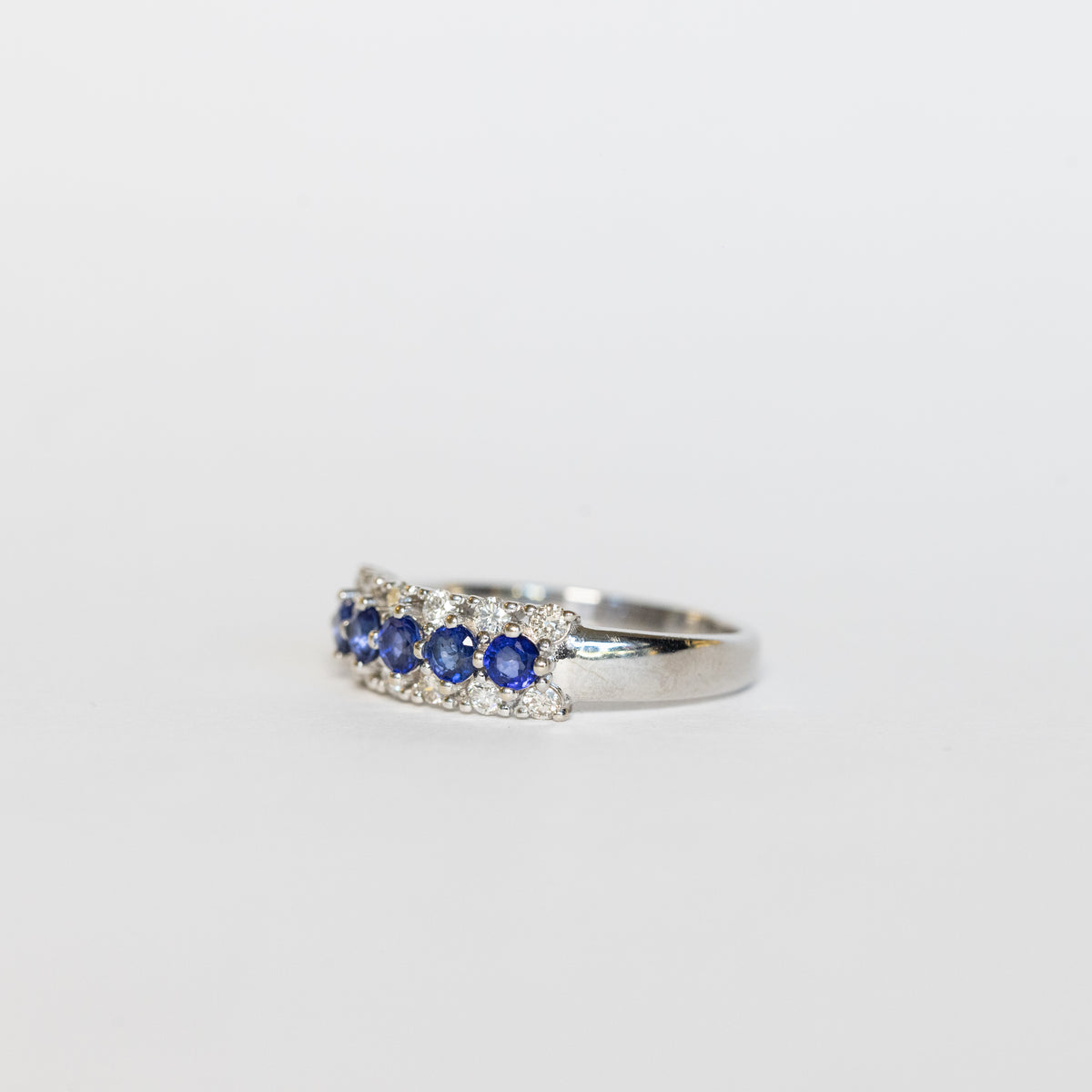 18kt white gold eternity ring with sapphires and diamonds