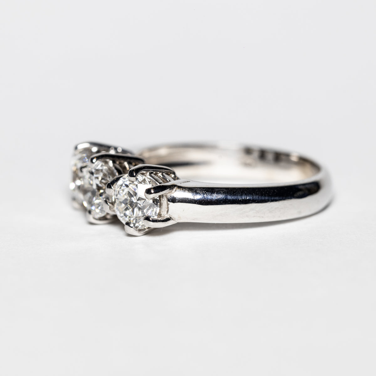 18KT White Gold Trilogy Ring with 6 Prong Design and Round Brilliant Diamonds