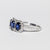 Anello Trilogy in Oro Bianco 18 KT con Zaffiri e Giro di Diamanti