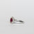 Anello in Oro Bianco 18 kt con Rubino centrale e Diamanti