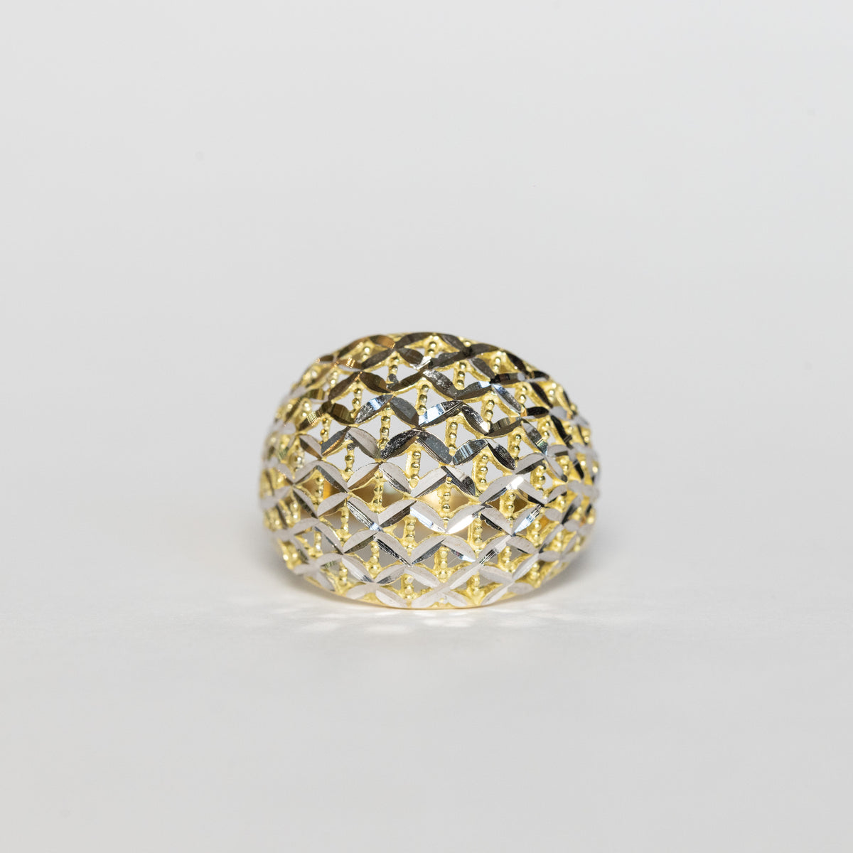 Anello fascia di rombi di oro giallo e bianco 18 kt