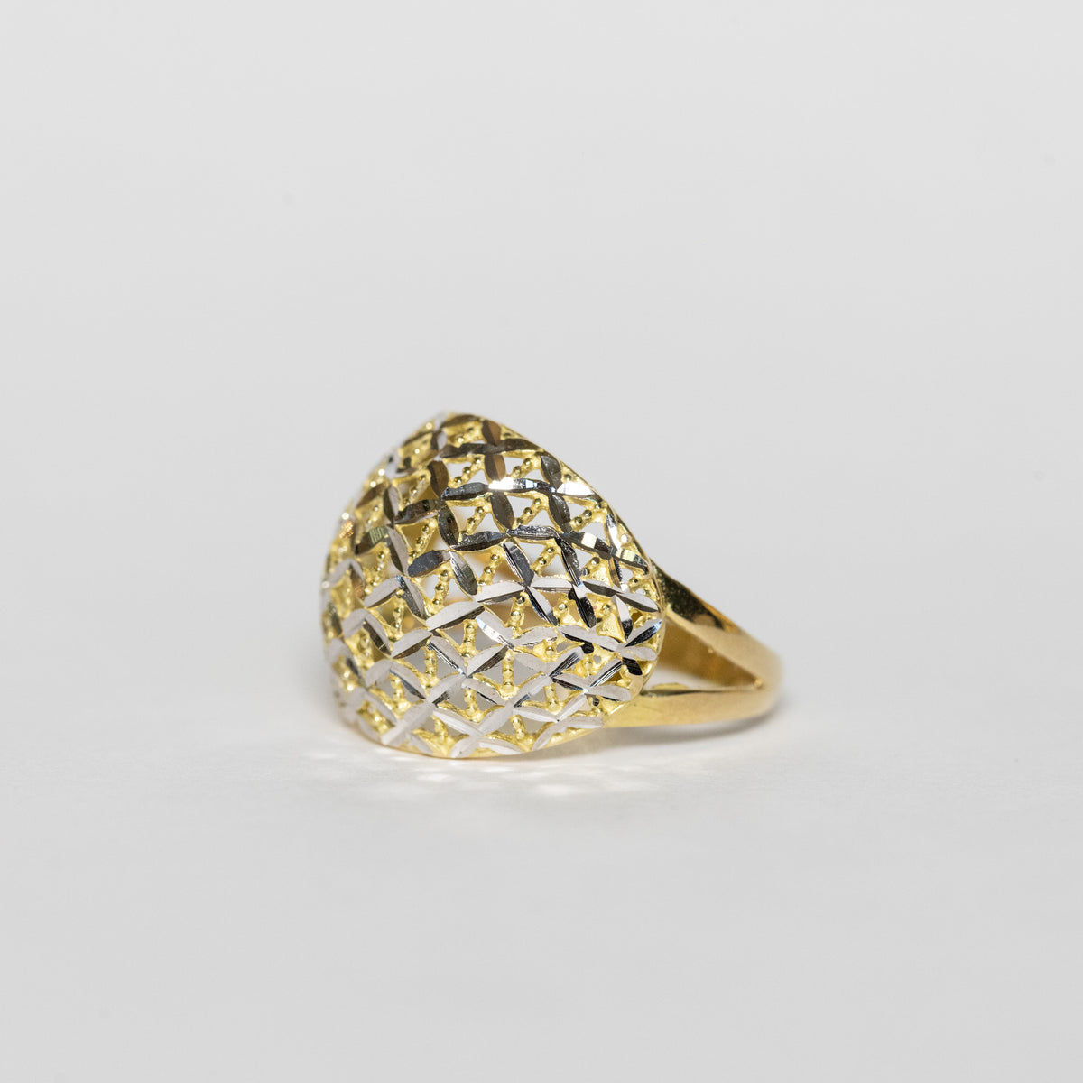 Anello fascia di rombi di oro giallo e bianco 18 kt
