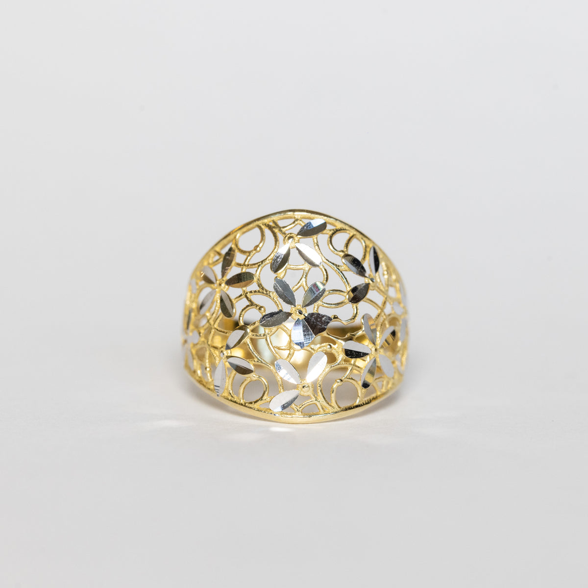 Anello Fascia di fiori In oro giallo e bianco 18 kt
