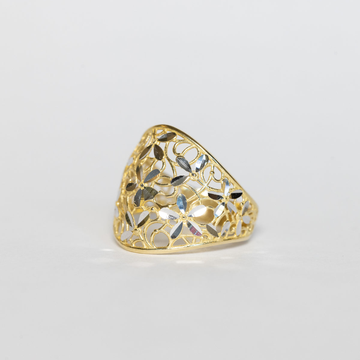 Anello Fascia di fiori In oro giallo e bianco 18 kt
