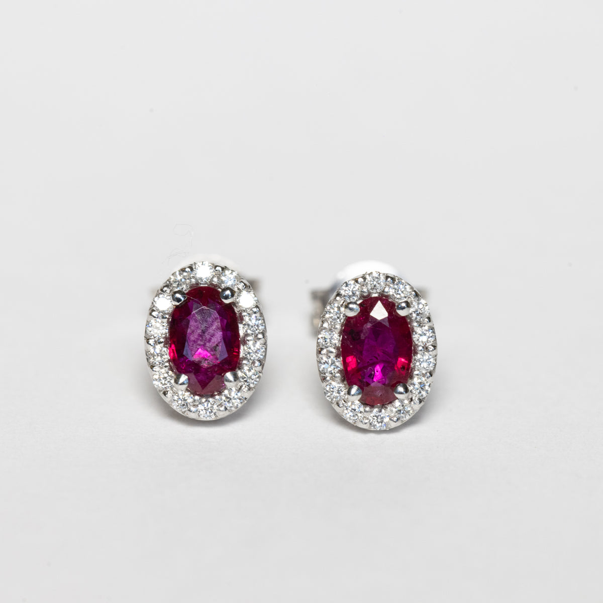 18kt white gold earrings with rubies and diamonds