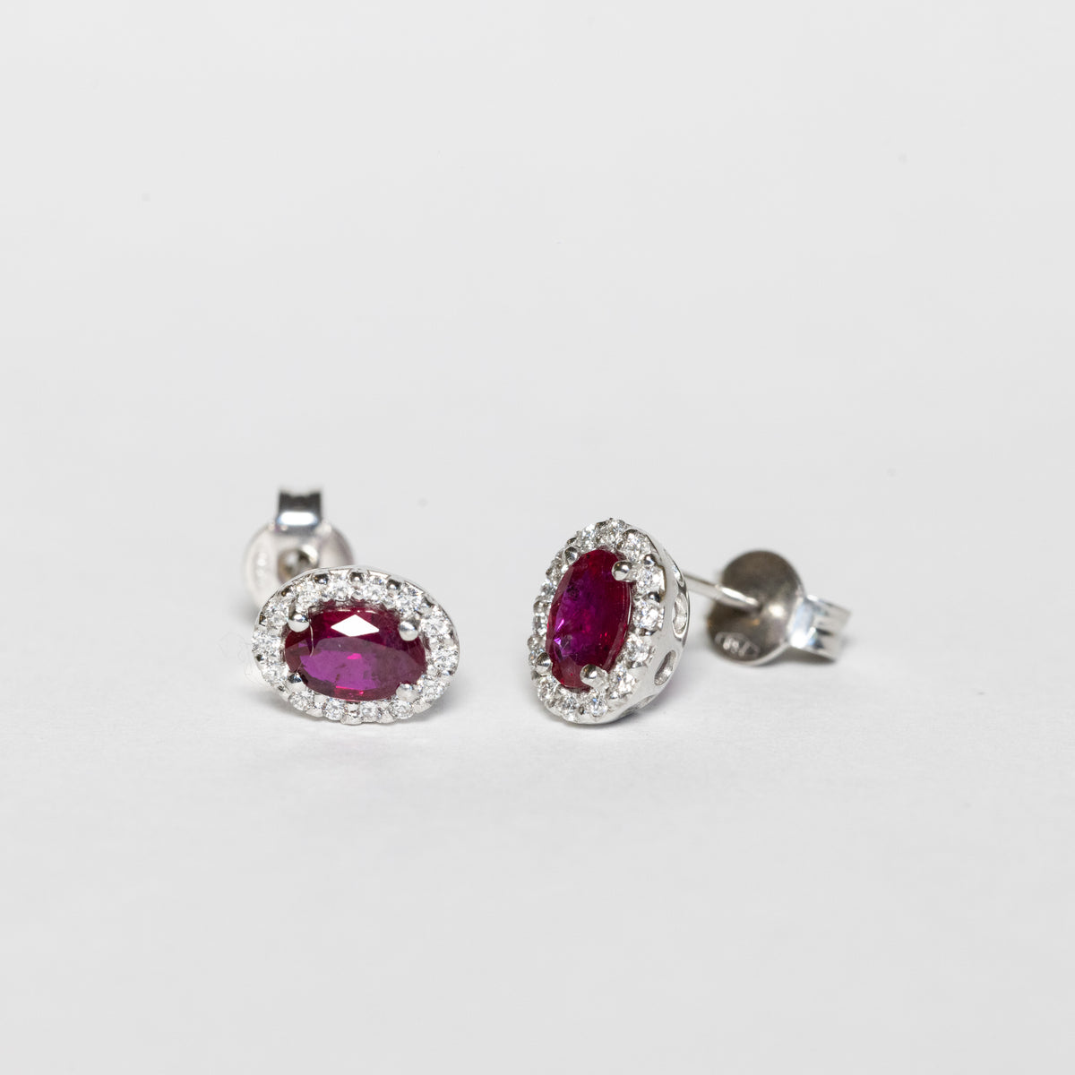 18kt white gold earrings with rubies and diamonds