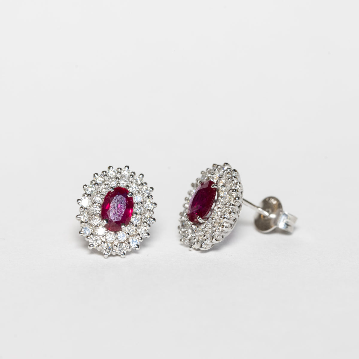 18kt White Gold Earrings with Central Ruby and Double Row of Diamonds 