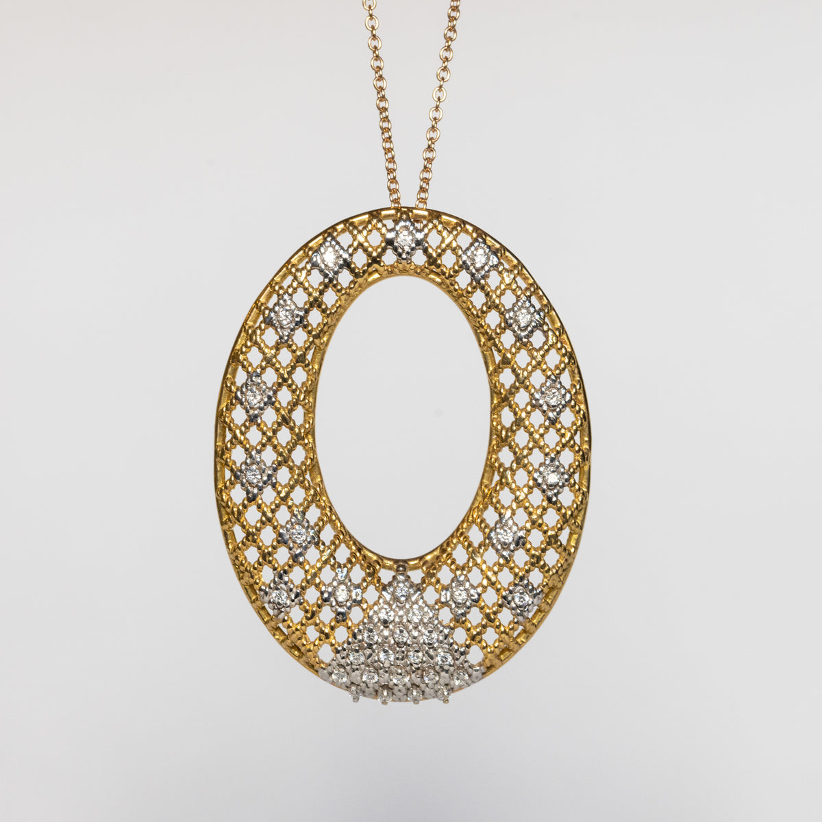 18kt yellow and white gold circle pendant necklace with diamonds