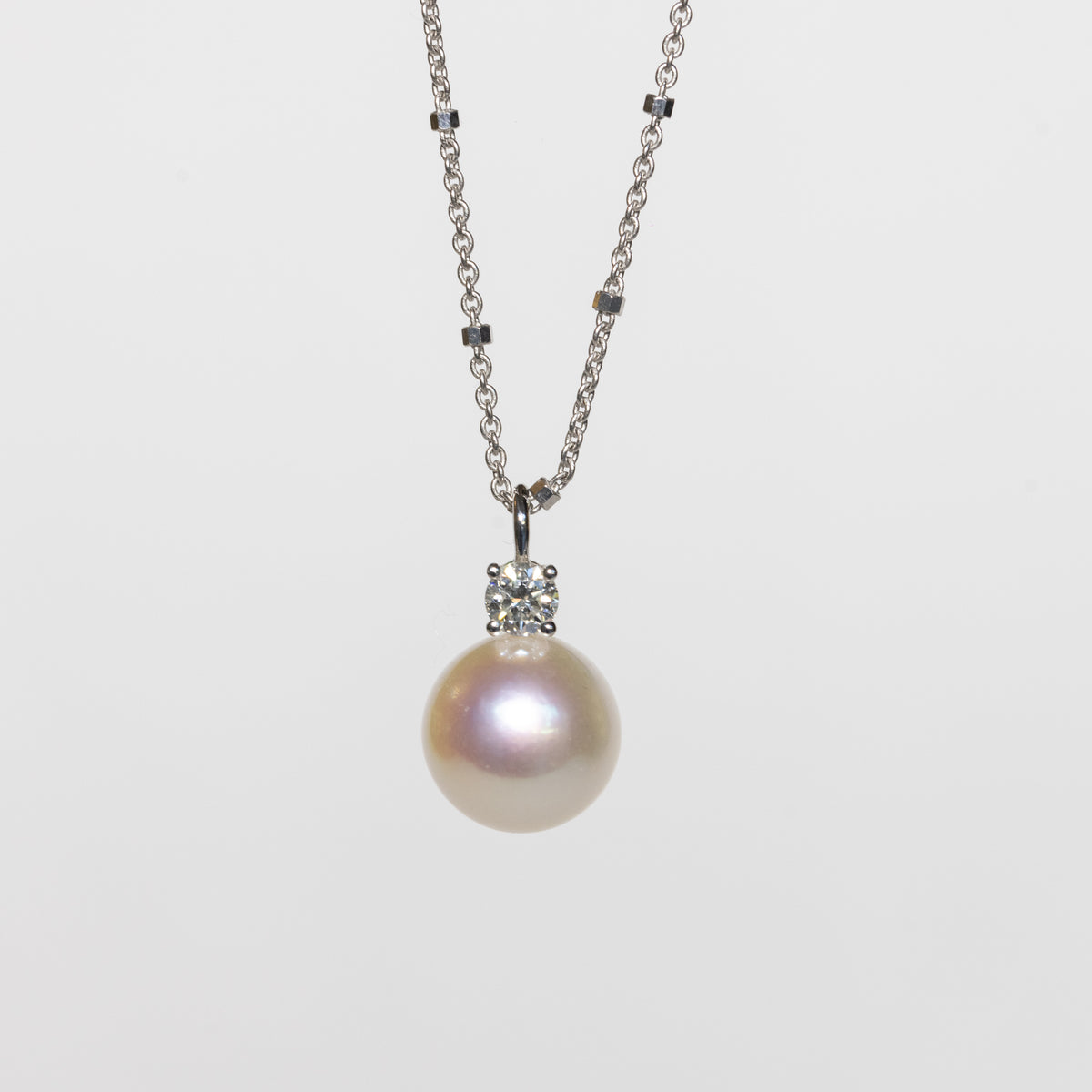 18kt White Gold Double Wrap Necklace with Central Akoya Pearl and Diamonds
