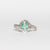 Anello in Oro Bianco 18 KT con Smeraldo Centrale Contornato di Diamanti Rotondo Brillante