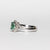 Anello in Oro Bianco 18 KT con Smeraldo Centrale Contornato di Diamanti Rotondo Brillante