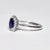 Anello Oro Bianco 18 kt con Zaffiro Ovale e Contorno in Diamanti