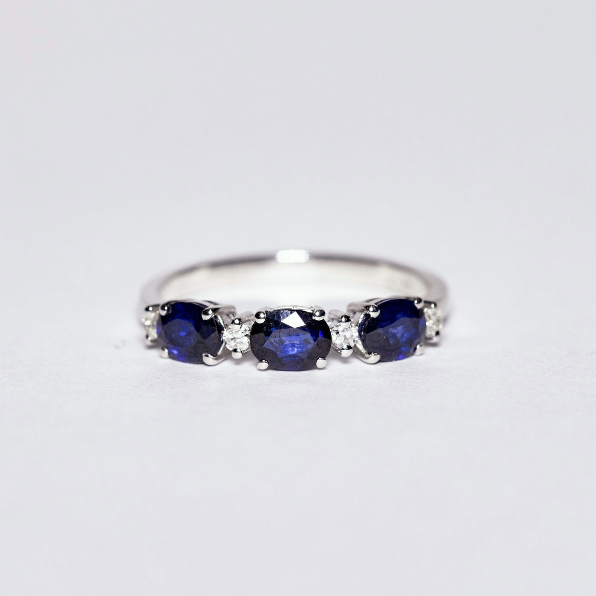 18kt White Gold Trilogy Ring With Oval Cut Sapphires and Diamonds