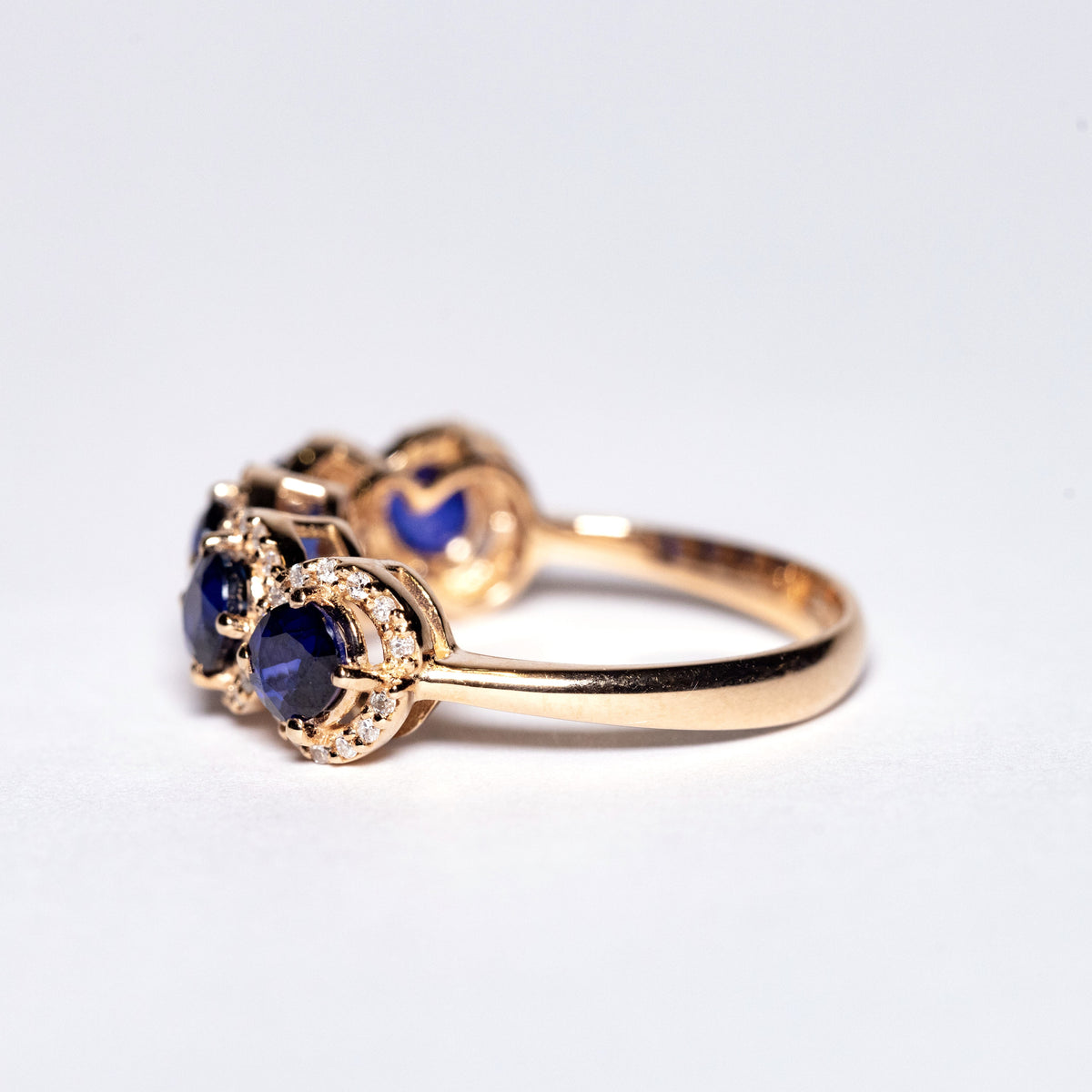 18kt Rose Gold Veretta Ring with Oval Cut Sapphires and Diamonds