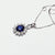 Collana In Oro Bianco 18 kt con Zaffiro Taglio Ovale con Giro di Diamanti