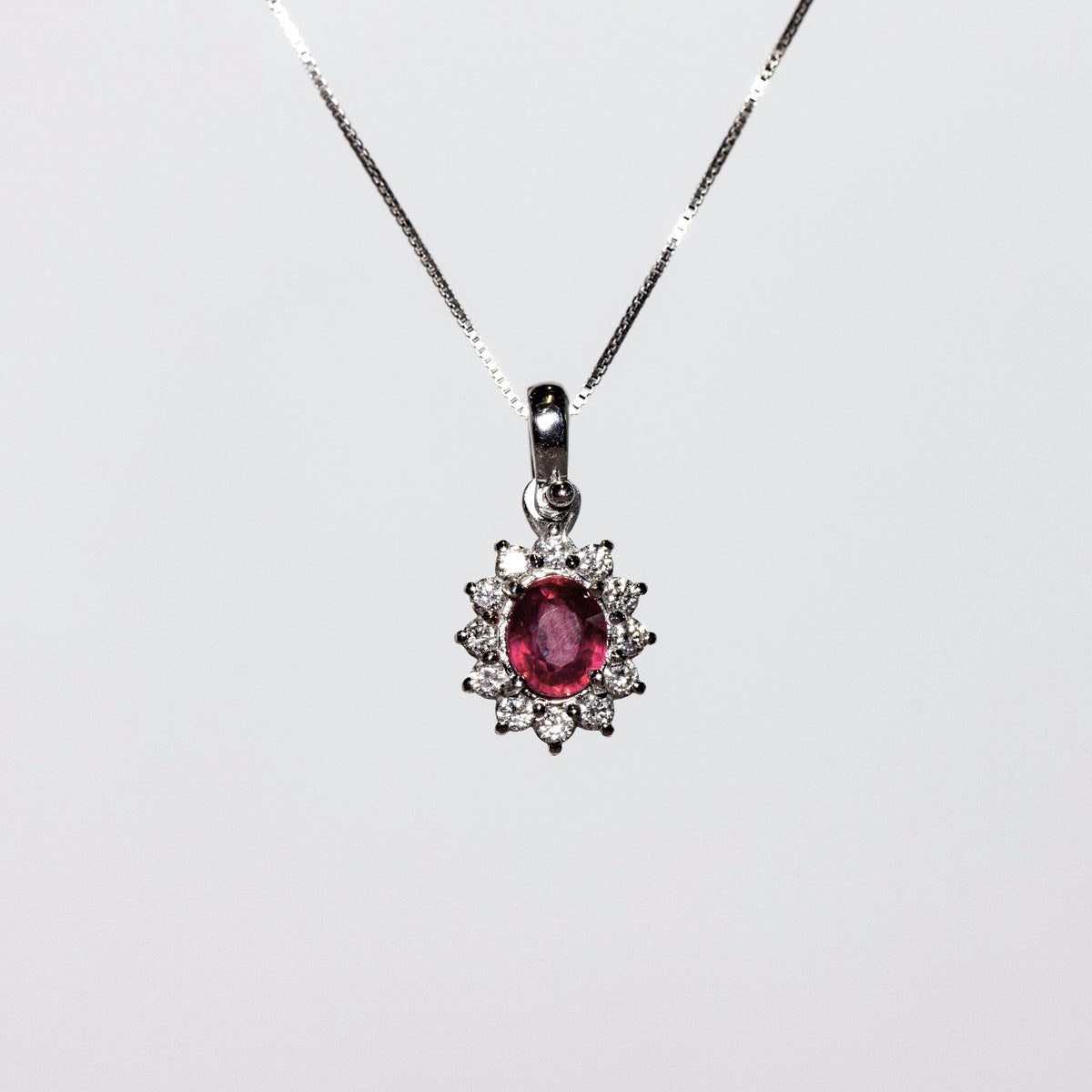 18kt White Gold Necklace with Oval Cut Ruby with Diamonds