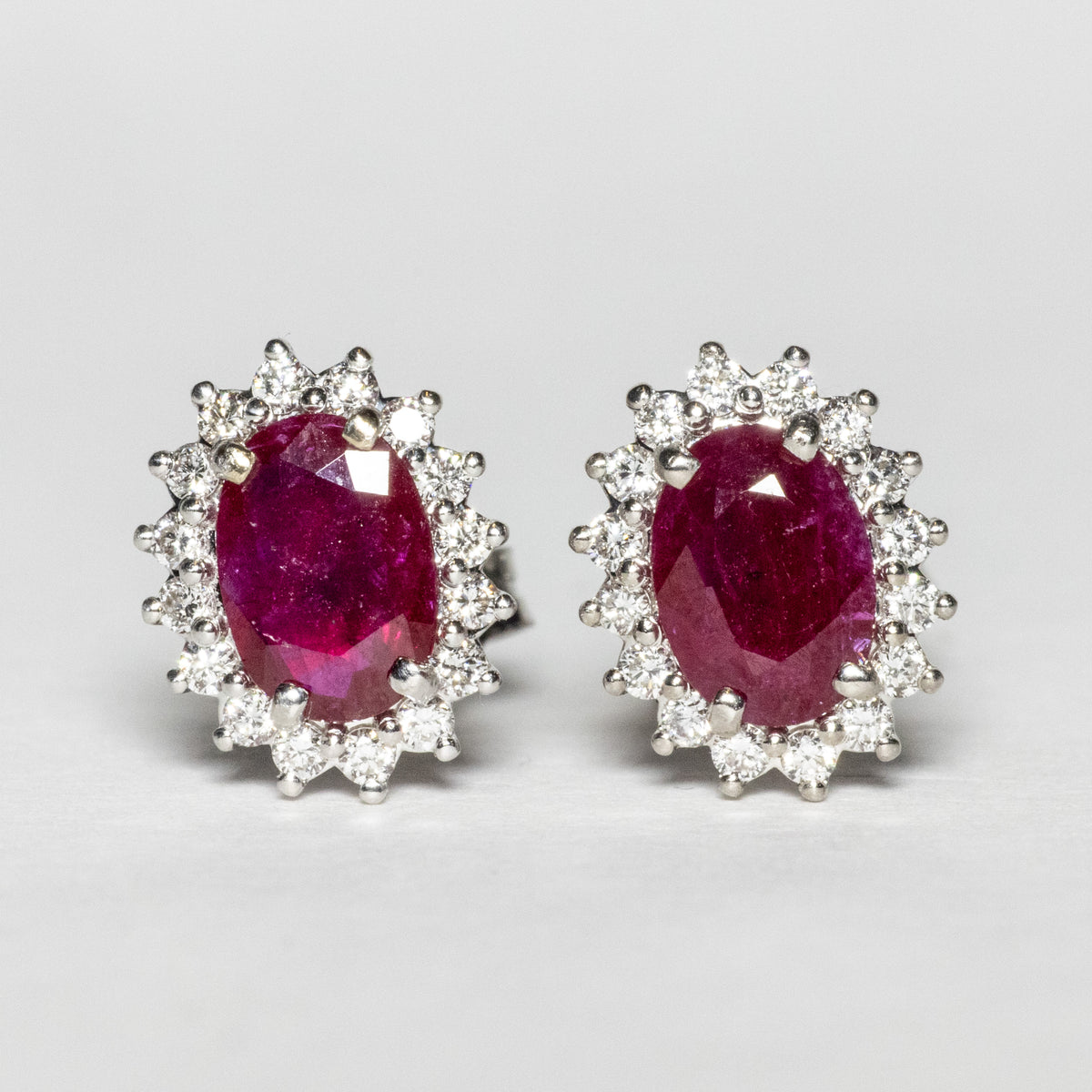 18kt White Gold Earrings with Central Rubies and Surround with Diamonds 