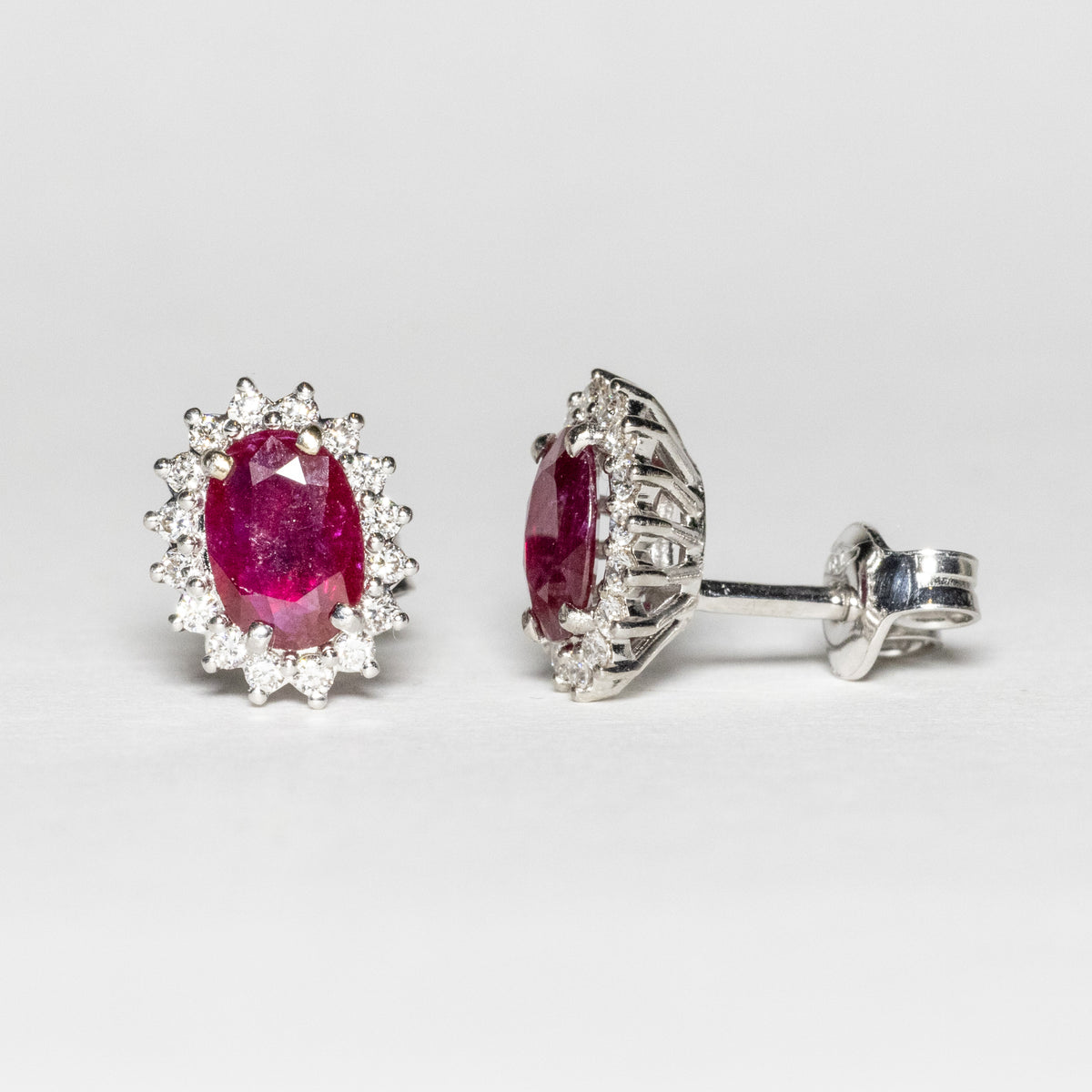 18kt White Gold Earrings with Central Rubies and Surround with Diamonds 