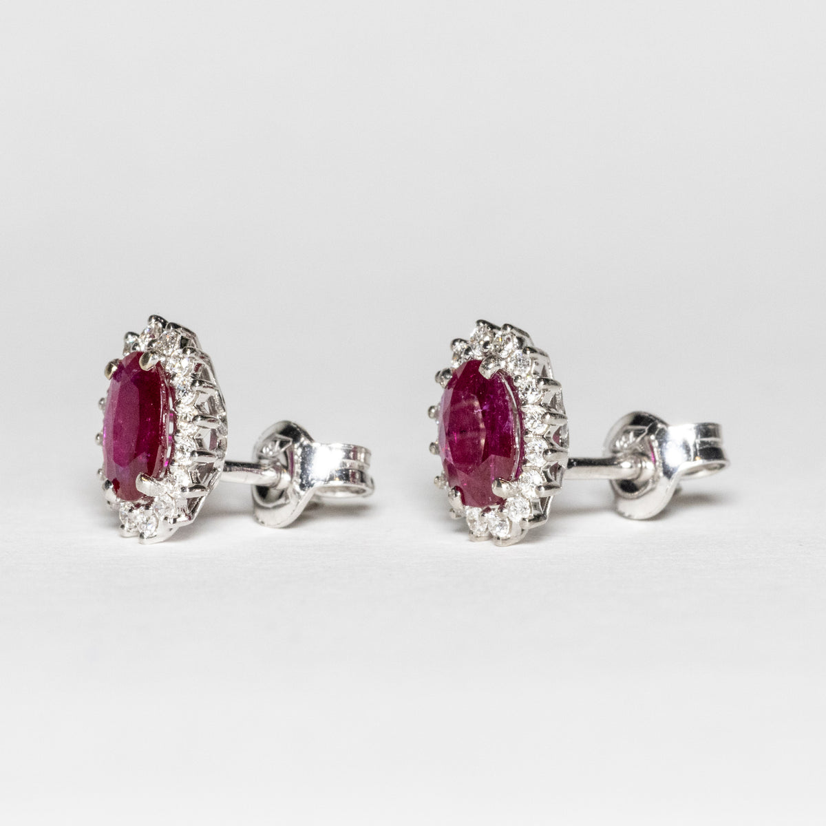 18kt White Gold Earrings with Central Rubies and Surround with Diamonds 