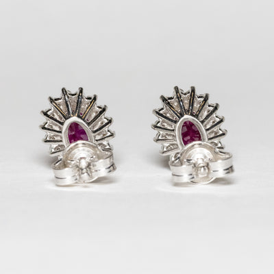 Orecchini in Oro Bianco 18 kt con Rubini centrali e contorno con diamanti