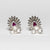 Orecchini in Oro Bianco 18 kt con Rubini centrali e contorno con diamanti
